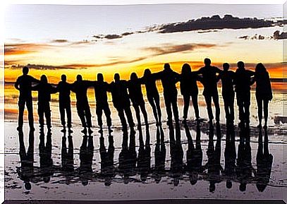 Row of people on the beach