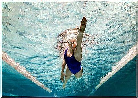 woman swimming in a swimming pool