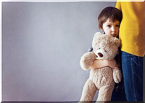 child and teddy bear