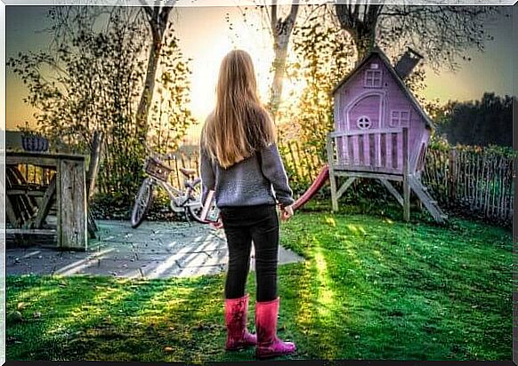 girl standing in the garden