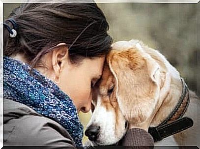 A woman with her pet dog.